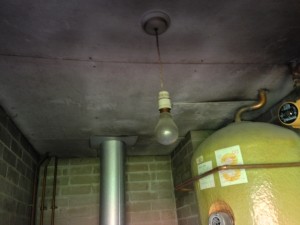 Asbestos insulation board (AIB) ceiling to Boiler Room