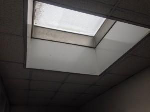 Asbestos insulation board (AIB) skylight liner
