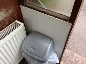 Asbestos insulation board (AIB) low-level window panel
